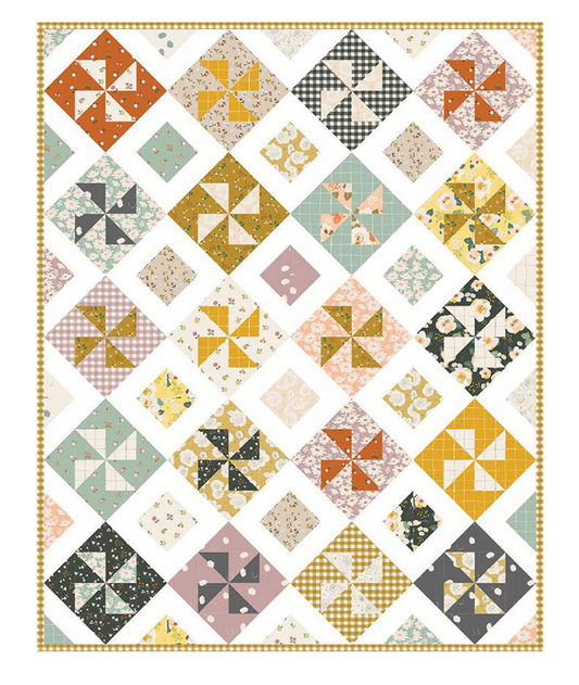 Spin Me Around Quilt Pattern by Minki Kim | Fat Quarter Friendly Quilt
